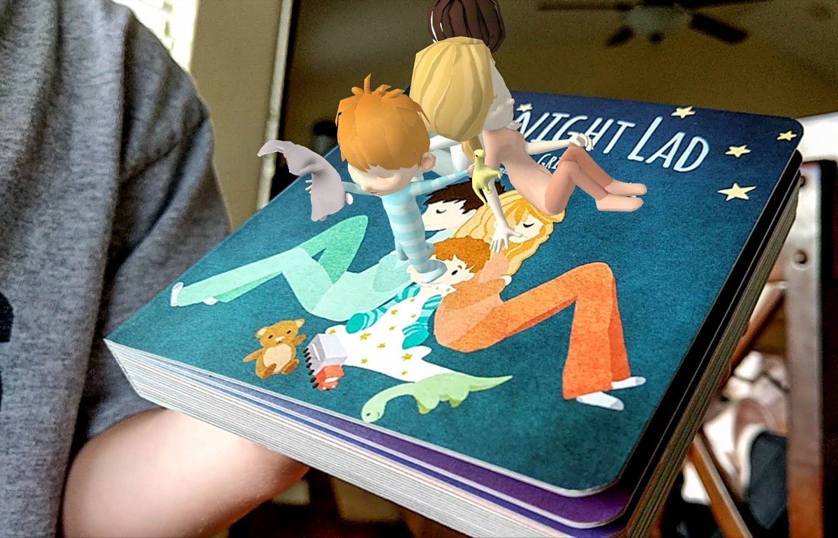 Goodnight Lad characters popping out of the book cover on a phone screen
